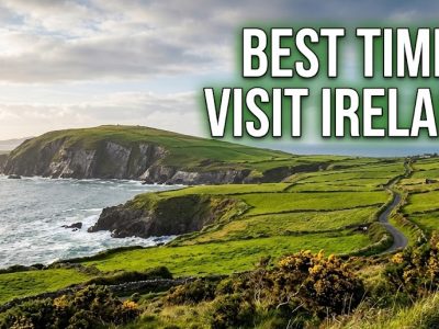 A winding road through the lush, green Irish countryside with a bright rainbow arching over a distant stone castle