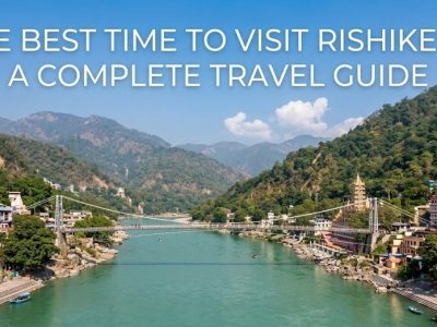A scenic view of the River Ganges flowing through the spiritual town of Rishikesh at the foothills of the Himalayas.