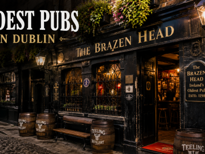 A warm, low-angle shot of a historic Dublin pub interior showcasing dark polished mahogany wood, vintage stained glass panels, and ambient gold lighting.